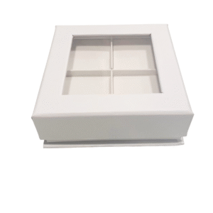 Square chocolate box with carboard and plastic cover.