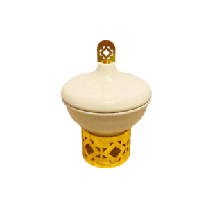 white jar with a gold crafted base